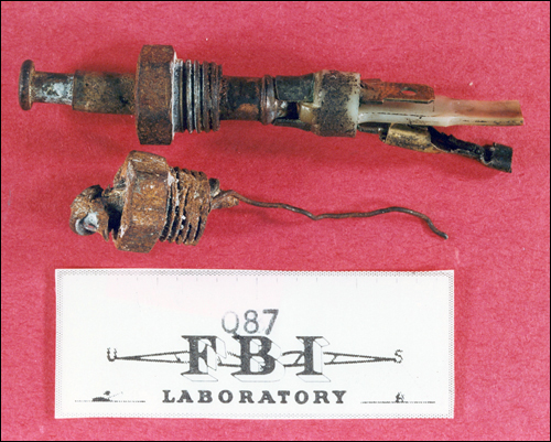 Recovered during the post-blast investigation was one of the bomb's many devious triggering mechanisms, similar to pop-up locks on car doors.