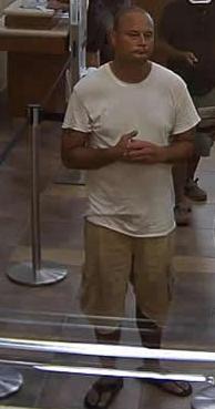 The FBI is releasing photographs from a bank robbery that took place on November 7, 2014, at approximately 9:27 a.