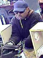 A bank robber who ran into a Chula Vista bank yelling  is being sought by the FBI and the Chula Vista Police Department.