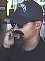 The FBI and San Diego Police Department seek the public's assistance to identify the unknown male responsible for robbing the Mission Federal Credit Union.