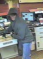 The FBI is seeking information regarding a bank robbery at the Illini Bank branch at 1311 West Jefferson, Auburn, Illinois.