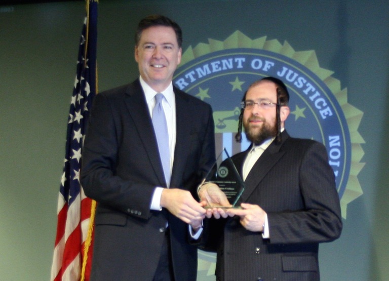 Rabbi Abraham Friedman Receives Director’s Community Leadership Award from Director Comey on April 15, 2016