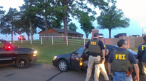 FBI agents at an Oklahoma horse farm that served as a money laundering front for Los Zetas, a powerful Mexican drug cartel. The government seized 455 horses in the case.