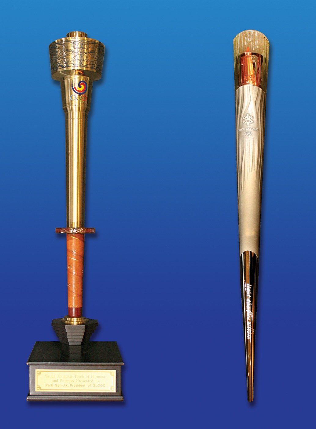 Photo of Olympic Torches from both the 1988 Summer Olympics in Seoul and the 2002 Winter Olympics in Salt Lake City. 