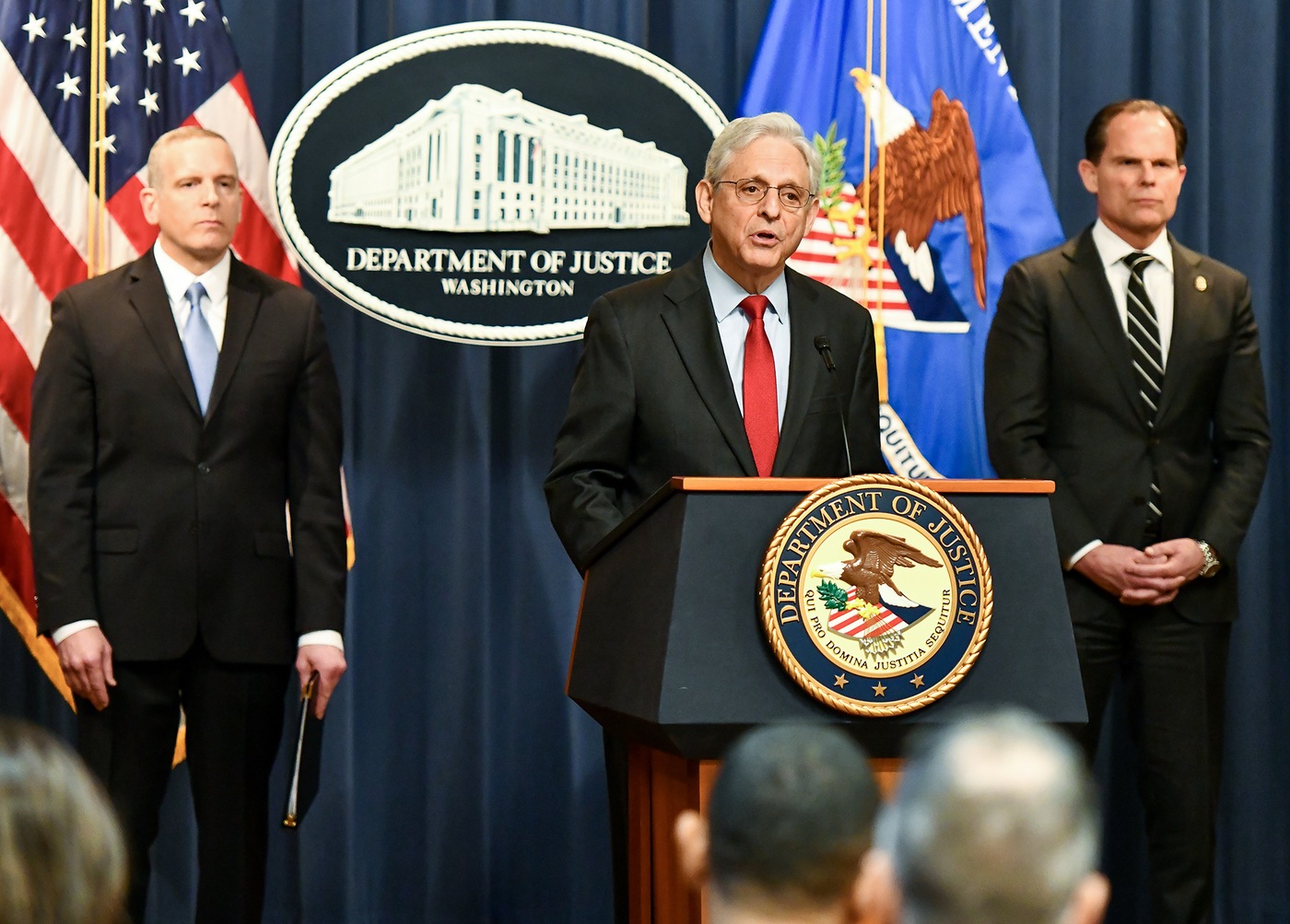Attorney General Merrick Garland gives remarks at a press conference May 2, 2023, in Washington, D.C. With him is FBI Deputy Director Paul Abbate, left, and DEA Deputy Administrator Lou Milione.