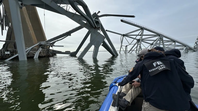 This photo shows FBI Evidence Response Team members working at the scene of the Francis Scott Key Bridge collapse on March 26, 2024, in Baltimore.