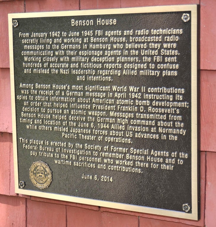 A plaque placed at Benson House in honor of the 70th anniversary of the D-Day invasion recognizes the counterintelligence efforts of FBI employees during WWII.