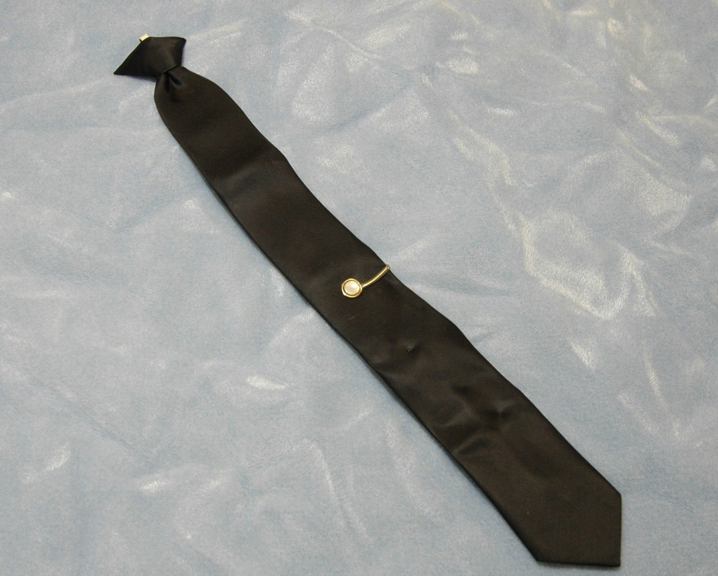 During the hijacking, Cooper was wearing this black J.C. Penney tie, which he removed before jumping; it later provided us with a DNA sample.