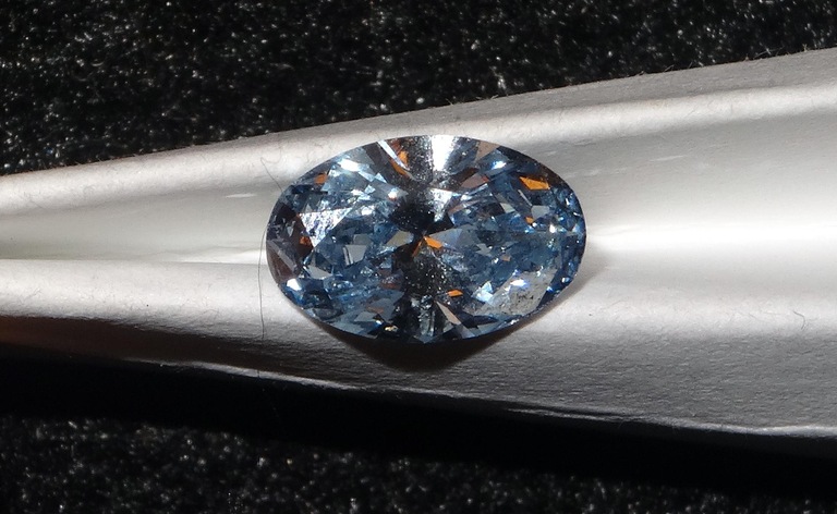 The loose 1.11 carat oval “blue diamond” worth $620,000 was one of the jewels falsely reported stolen in 2004 by Joseph Harold Gandy, who went to prison for his crime following an investigation by the FBI and its partners.