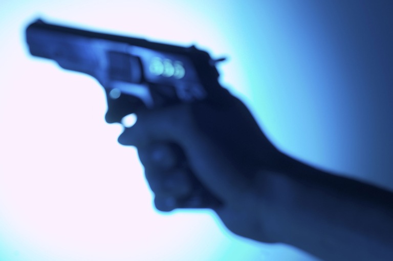 Blurred Handgun (Stock Image)
