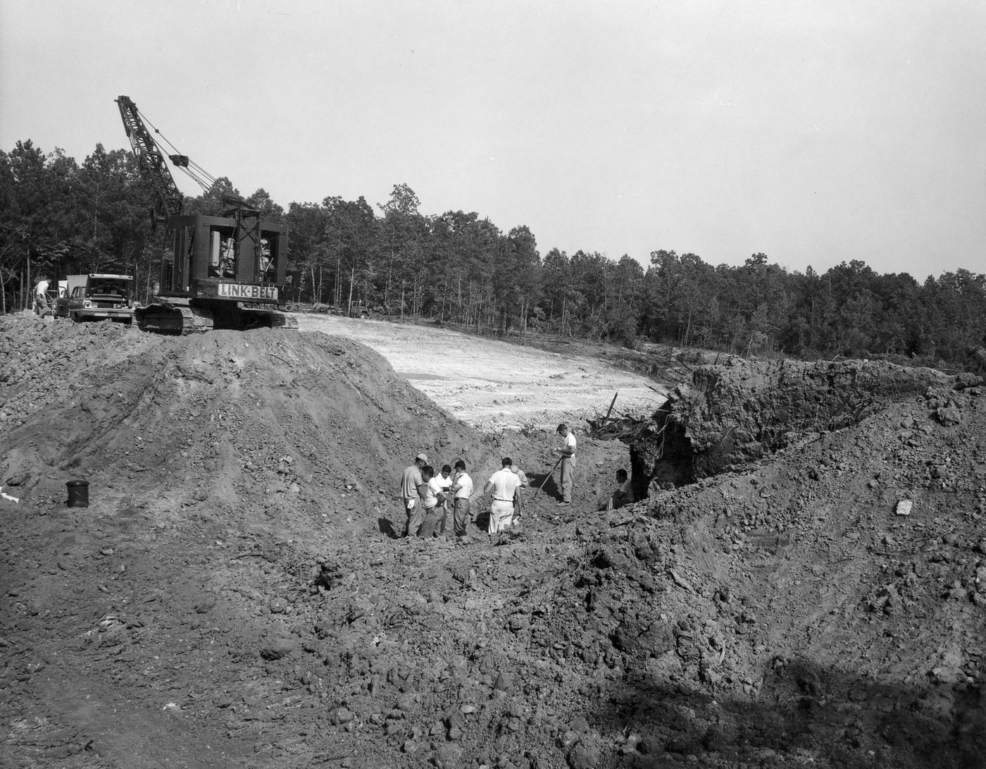 Agents digging up the remains of the three murdered civil rights workers--Andrew Goodman, James Chaney, Michael Schwerner--in the Mississippi Burning case (MIBURN) in 1964 in Meridian, Mississippi.