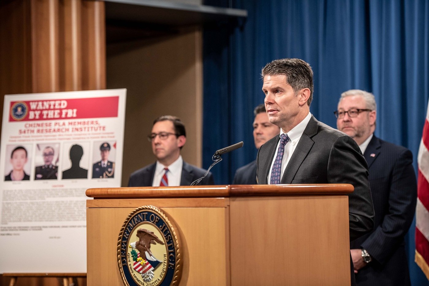 FBI Deputy Director David Bowdich speaks at a February 10, 2020 press conference at the Department of Justice in Washington, D.C., announcing charges against four Chinese military-backed hackers in connection with the 2017 cyberattack against Equifax.
