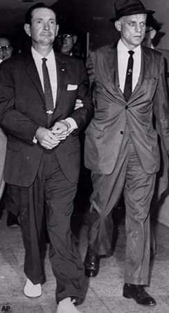 Byron De La Beckwith (left) is escorted into the Jackson Police station by FBI agents on June 23, 1963. AP Photo. In 1994, Beckwith was convicted of the 1963 murder of civil rights activist Medgar Evers.
