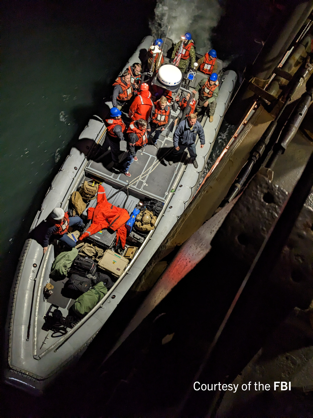 FBI Subject Matter Experts from LD, OTD and CIRG prepare to board the USS Carter Hull to conduct search and recovery operations in collaboration with the US Navy.
