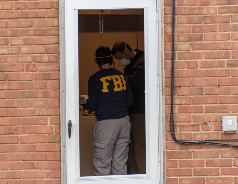 FBI Agents at a Home in Cleveland During Operation Disarray