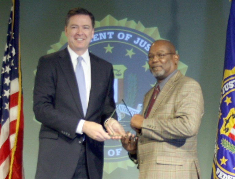 Dale R. Landry Receives Director’s Community Leadership Award from Director Comey on April 15, 2016