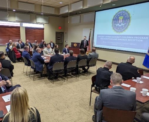 Recognition and awards reception attendees are welcomed by FBI Supervisory Senior Resident Agent Allen Pack