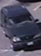 Vehicle used by a suspect in the robbery of the TCF Bank located in a Kroger grocery store at 8920 West 8 Mile Road in Royal Oak Township, Michigan on September 7, 2014. The vehicle is described as a late model, dark green Ford Explorer.