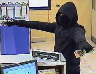 Suspect in the May 29, 2014 robbery of a PNC Bank in Galesburg, Michigan, and the July 29, 2014 robbery of a Comerica Bank in Comstock Twp., Michigan.