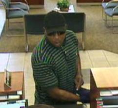 Suspect in the August 31, 2014 robbery of a TCF Bank branch in Dearborn Heights, Michigan.