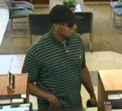 Suspect in the August 31, 2014 robbery of a TCF Bank branch in Dearborn Heights, Michigan.