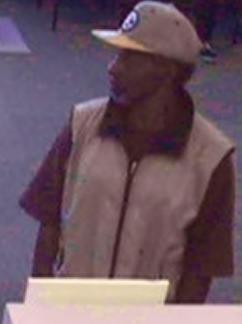 Suspect in the robbery of Charter One Bank at 23011 Woodward Avenue in Ferndale, Michigan on August 13, 2014.