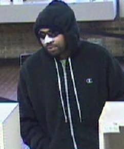 Suspect in the robbery of the TCF Bank branch located at 17535 12 Mile Road in Lathrup Village, Michigan on October 6, 2014.