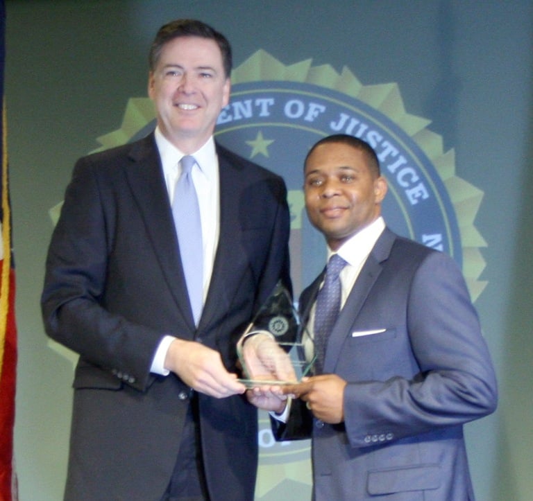 Dominic Stokes Receives Director’s Community Leadership Award from Director Comey on April 15, 2016