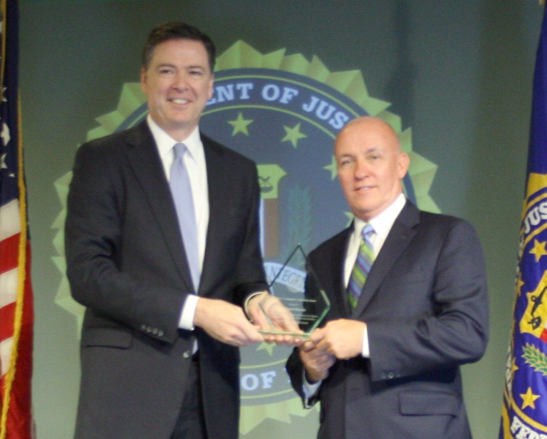 Eddie Mannis Receives Director’s Community Leadership Award from Director Comey on April 15, 2016
