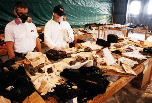 On October 31, 1999, Egypt Air Flight 990 bound from New York to Cairo crashed into the Atlantic Ocean south of Nantucket Island, Massachusetts. Here, Boston personnel examine the wreckage.
