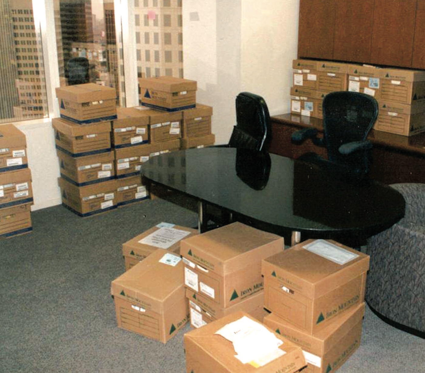 Boxes of evidence in an office at Enron headquarters in Houston in 2002. More than 3,000 boxes of evidence and more than four terabytes of digitized data were collected by FBI agents in the weeks after Enron declared bankruptcy on December 2, 2001.