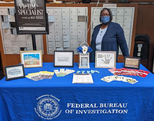 FBI Baltimore observed National Slavery and Human Trafficking Prevention Month in January 2022. To raise awareness about the different forms of human trafficking, community outreach specialist Marvella Gray distributed materials to employees.
