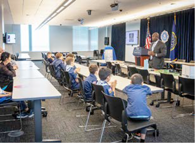 In 2023, FBI Houston hosted a group of Cub Scouts to teach them about career opportunities in public service. The Scouts learned about different parts of the FBI, such as art crime, and also got to participate in hands-on activities, including an office tour.