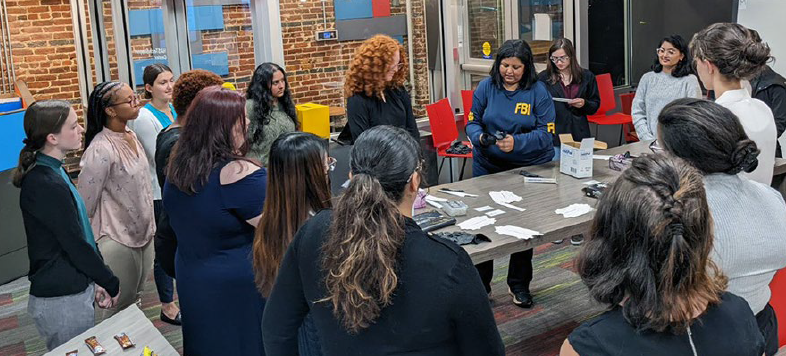 Staff from FBI Richmond share information on the different career pathways available to Bureau employees with students from Virginia Commonwealth University (VCU) during a Collegiate Academy held in 2022. Hosted by VCU’s Forensic Science Department, this was the FBI’s first-ever academy program with an emphasis on science, technology, engineering, and math.