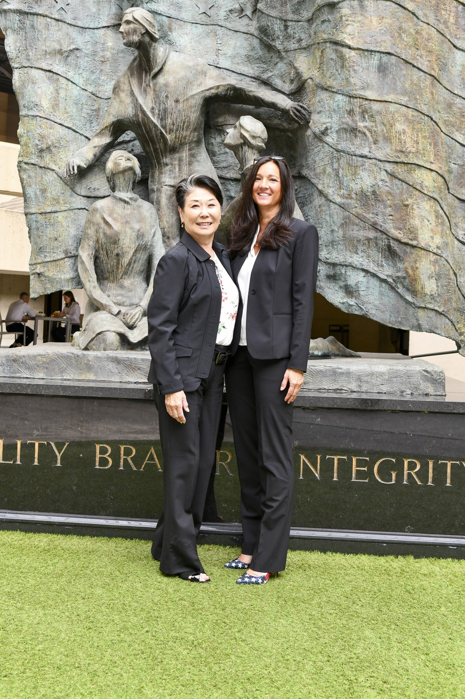Jo Ann Sakato (left) was the first female Asian American special agent in the FBI. Larissa Knapp is now the highest ranking female Asian American special agent in the FBI. Knapp serves as the executive assistant director of the the FBI's National Security Branch.