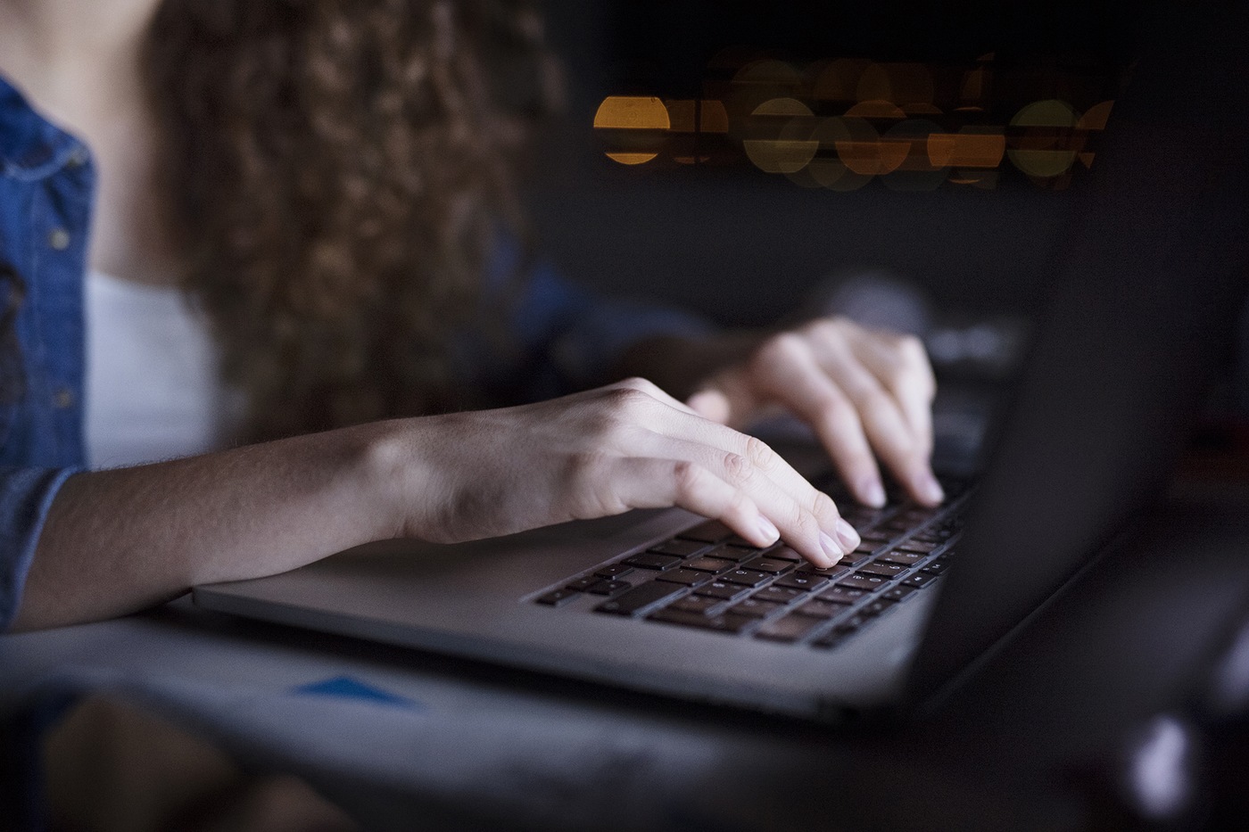 Girl Typing on Laptop (Stock Image)