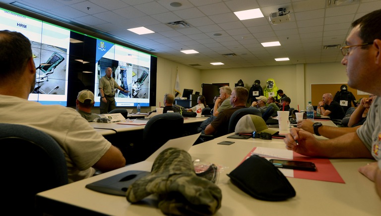 An FBI Hazardous Devices School instructor provides a briefing to public safety bomb technicians.
