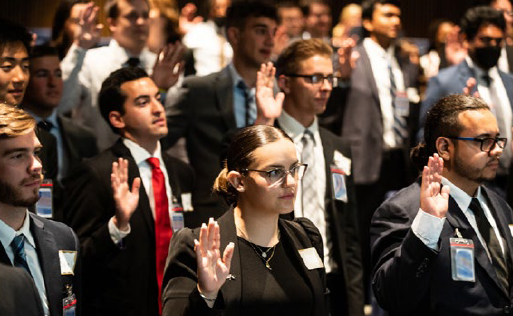 A group of honor interns are sworn in. 