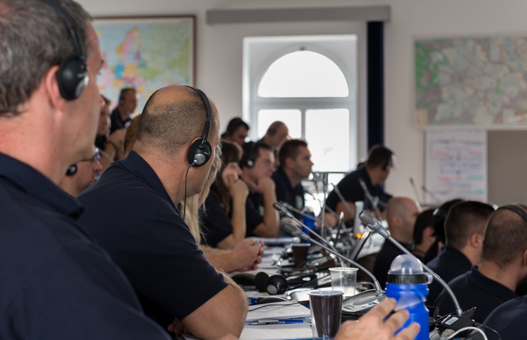 ILEA Students Wearing Headsets for Translations