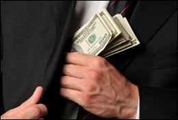 Man Putting Money in Jacket