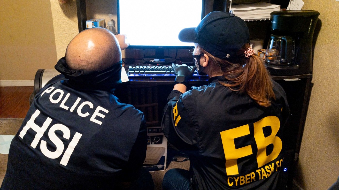 Department of Homeland Security Investigations and FBI conduct a search during a Joint Criminal Opioid and Darknet Enforcement (JCODE) team operation in 2021.