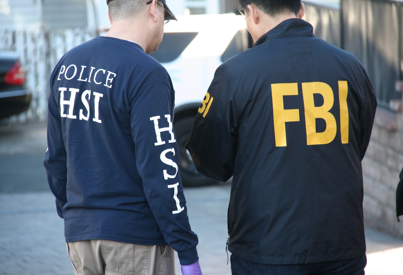 JCODE Task Force members confer during search warrant execution in L.A. in March 2020.