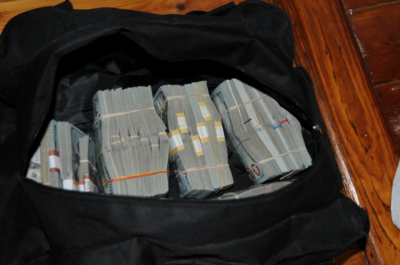 Cash seized in Joint Criminal Opioid and Darknet Enforcement (JCODE) operation in 2021.