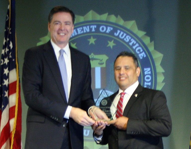Jerry Silva Receives Director’s Community Leadership Award from Director Comey on April 15, 2016