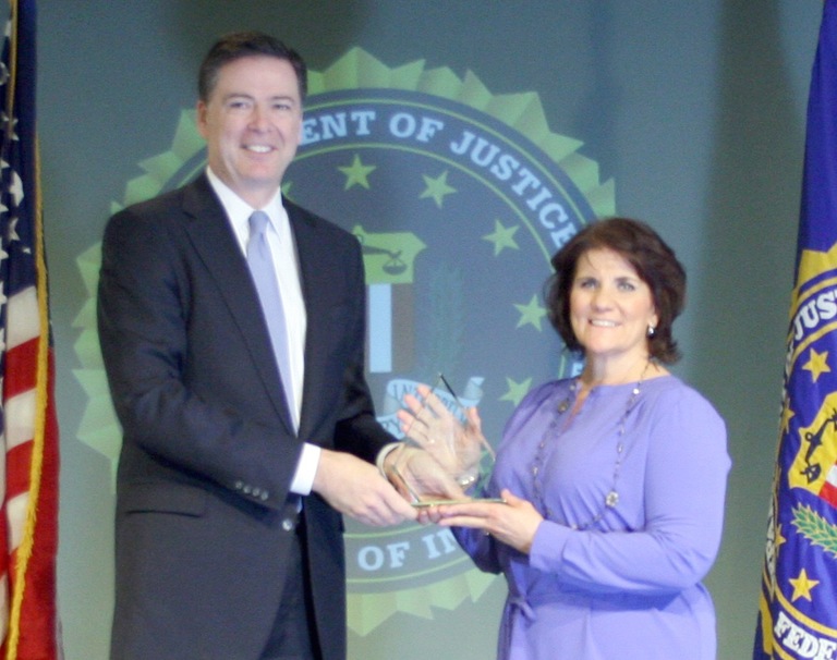June Vining Receives Director’s Community Leadership Award from Director Comey on April 15, 2016