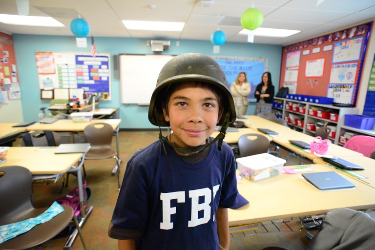 In 2014, the Monarch School’s fifth-grade class took part in the Junior Special Agent Program sponsored by the FBI’s San Diego Division. Here, one of the 22 fifth-graders in the class poses in a tactical, SWAT-style helmet.