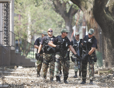  FBI SWAT in New Orleans Following Hurricane Katrina (AP Photo)