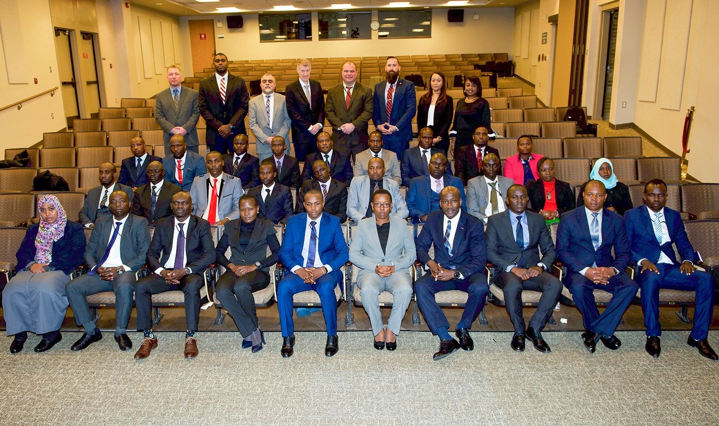 Kenyan police and intelligence officers pose with FBI and State Department officials during a February 10, 2020 ceremony at the FBI Academy in Quantico, Virginia, announcing a new Joint Terrorism Task Force in Kenya—the first such task force to be located outside the U.S.