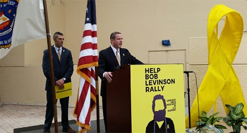 Paul Abbate (right), assistant director in charge of the FBI’s Washington Field Office and Miami FBI Special Agent in Charge George Piro address a rally on behalf of Robert Levinson March 5, 2016, in Miami.