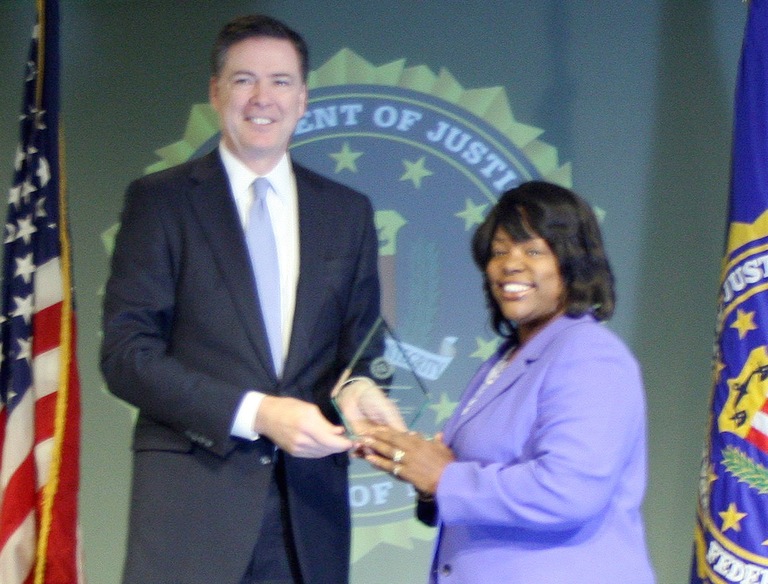 Linda A. Walker Receives Director’s Community Leadership Award from Director Comey on April 15, 2016